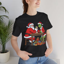 Load image into Gallery viewer, Santa vs The Grinch – Funny Christmas Graphic Tee (Unisex)